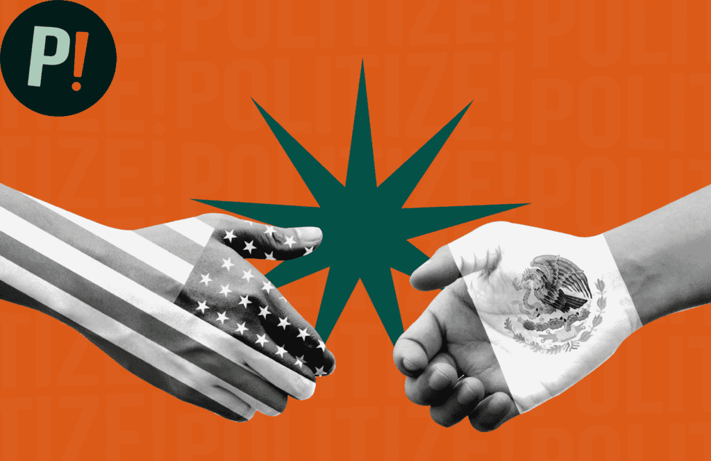 Manos con las banderas de Estados Unidos y México representando la relación política